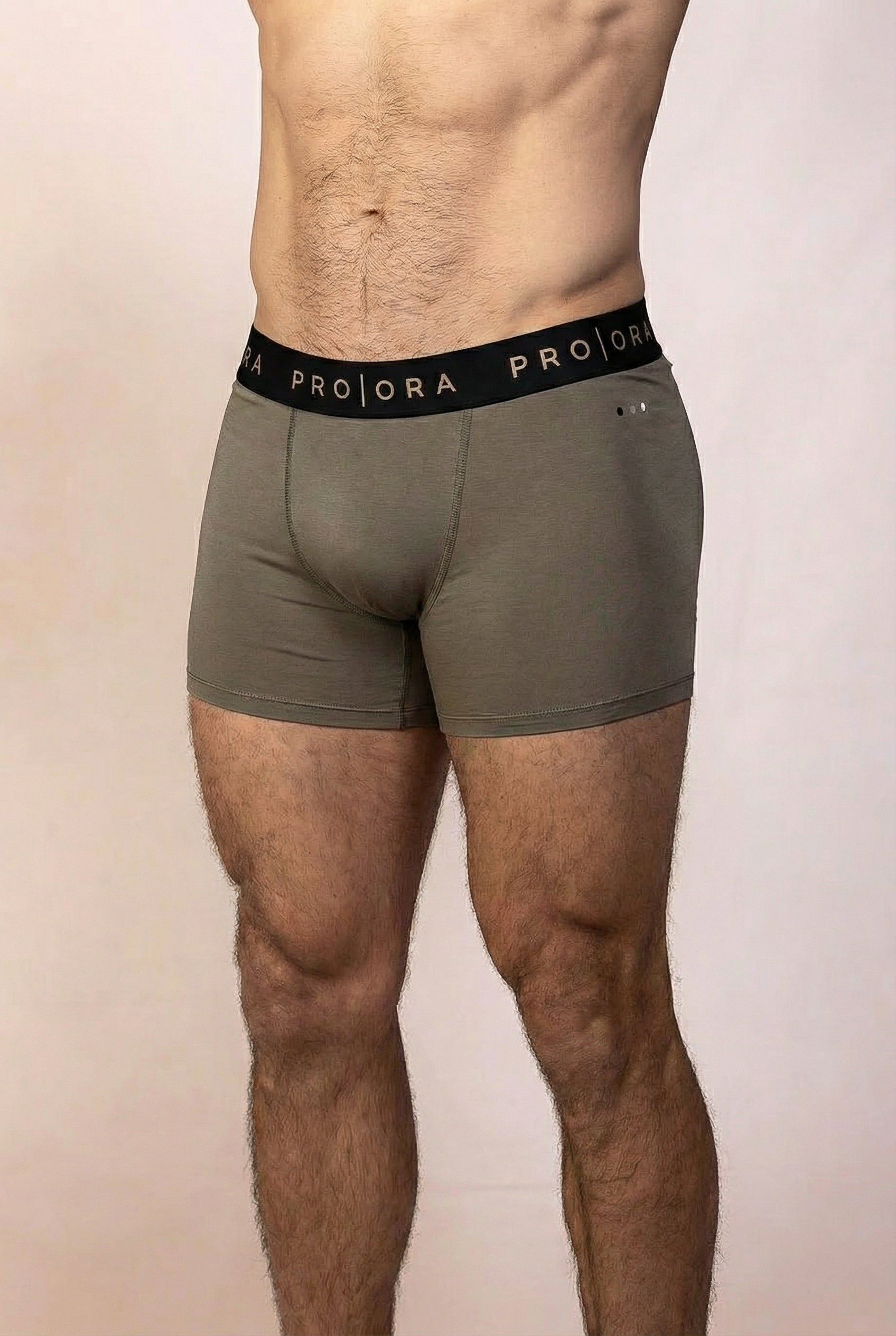 PRO | ORA men’s the precision brief in Olive Smoke, studio product image, front view