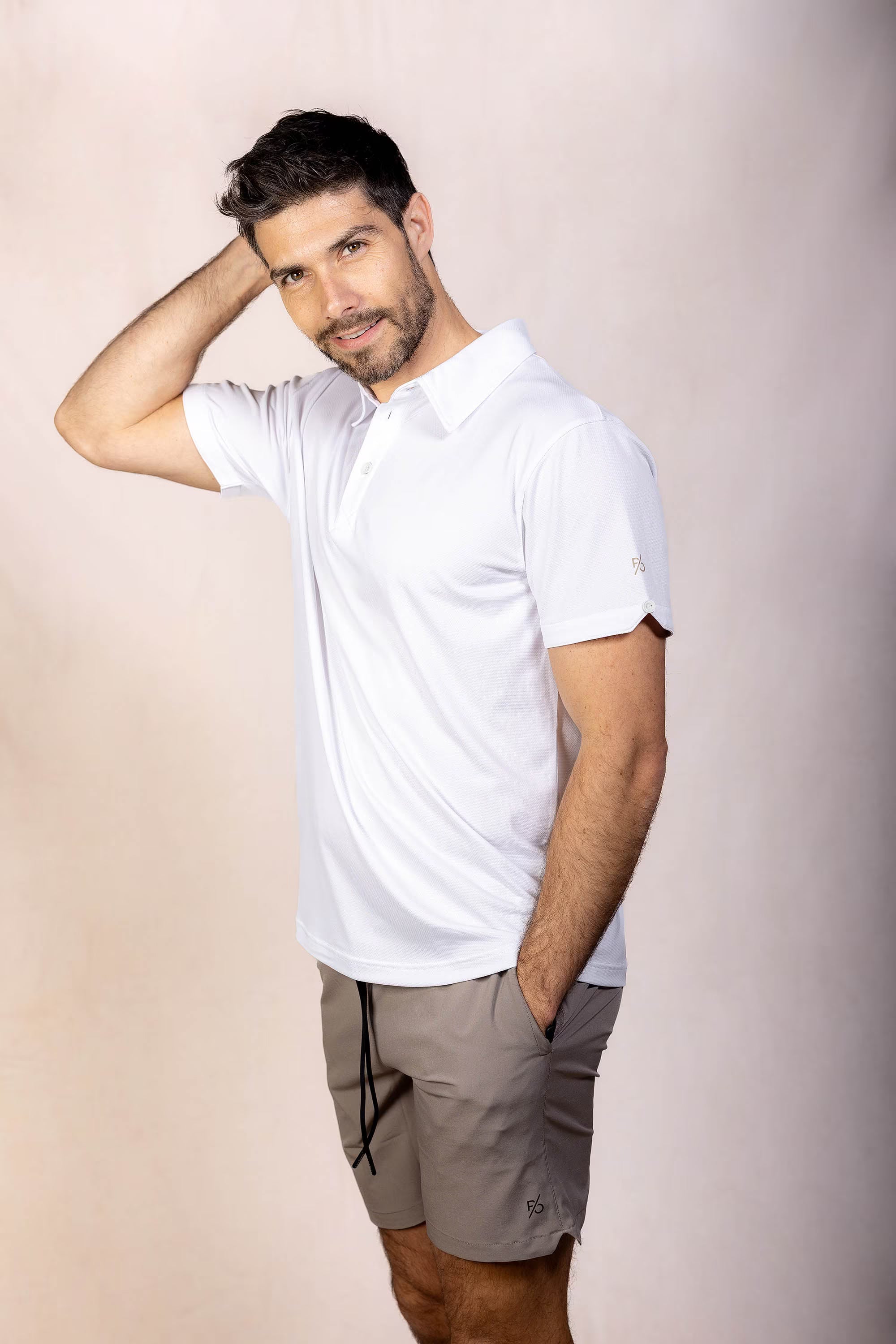 PRO | ORA men’s proformance polo shirt in White Onyx, studio product image, front view