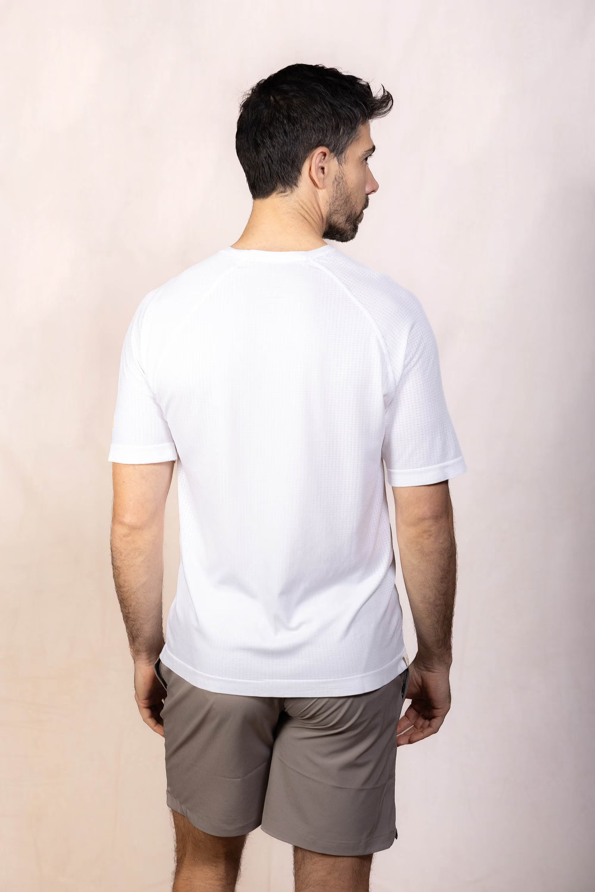 PRO | ORA men’s proformance t in White Onyx, studio product image, rear view