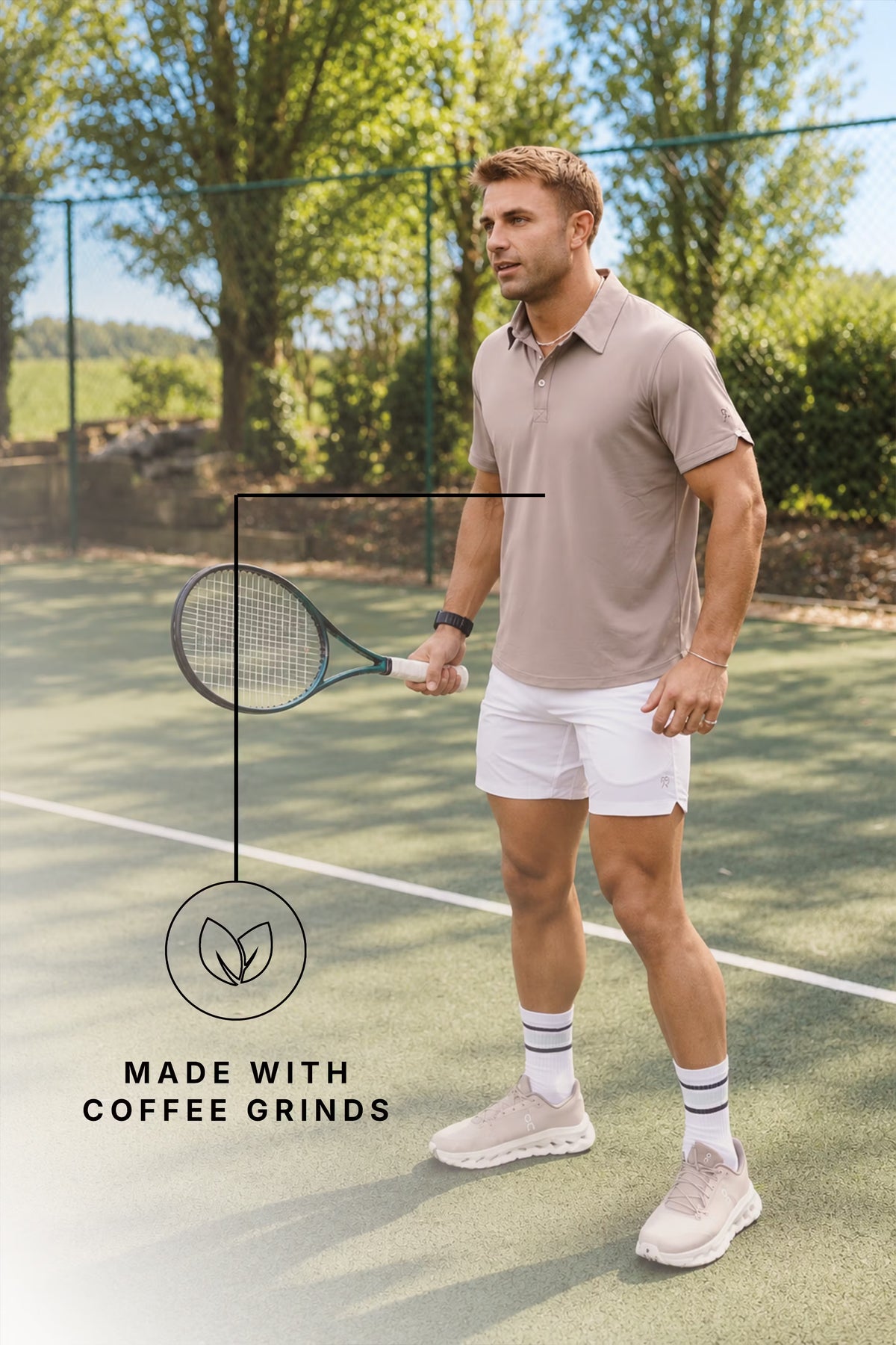 Man stretching for a forehand on a clay court in a taupe PRO | ORA polo and white shorts, with a roundel reading Made with coffee grinds