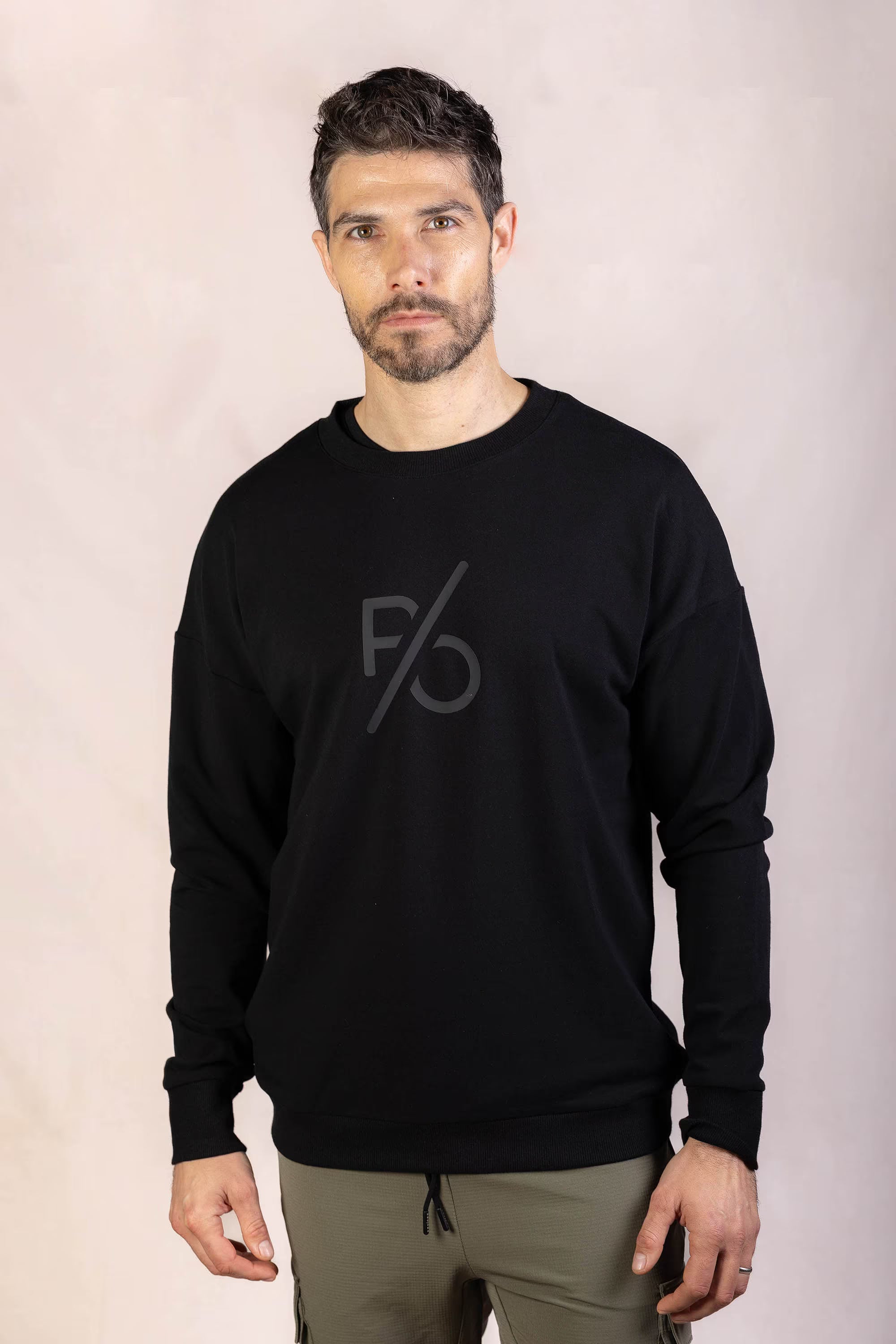 PRO | ORA men’s the aura drop sweater in Black Beauty, studio product image, front view