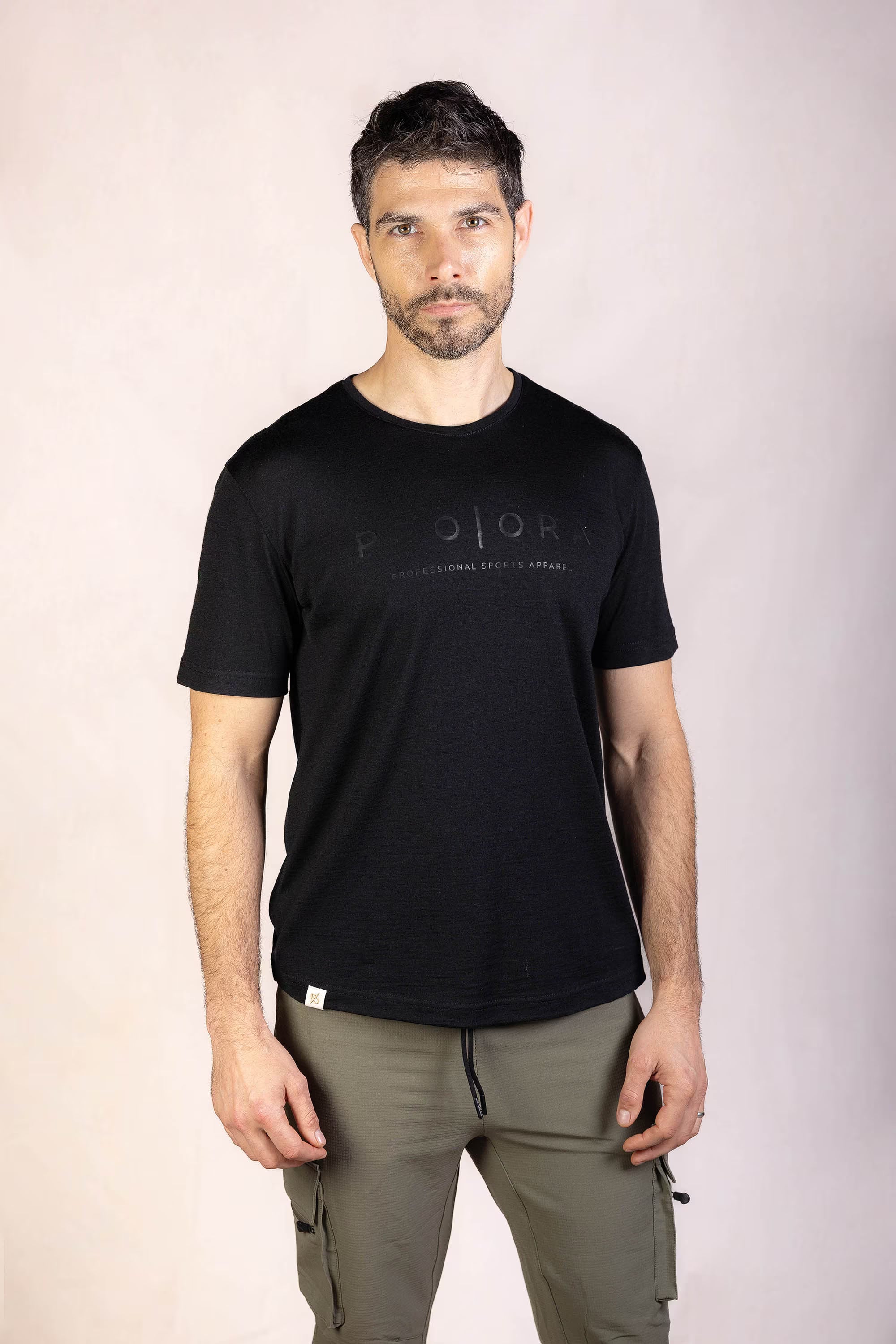 PRO | ORA men’s the merino t in Black On Black, studio product image, front view