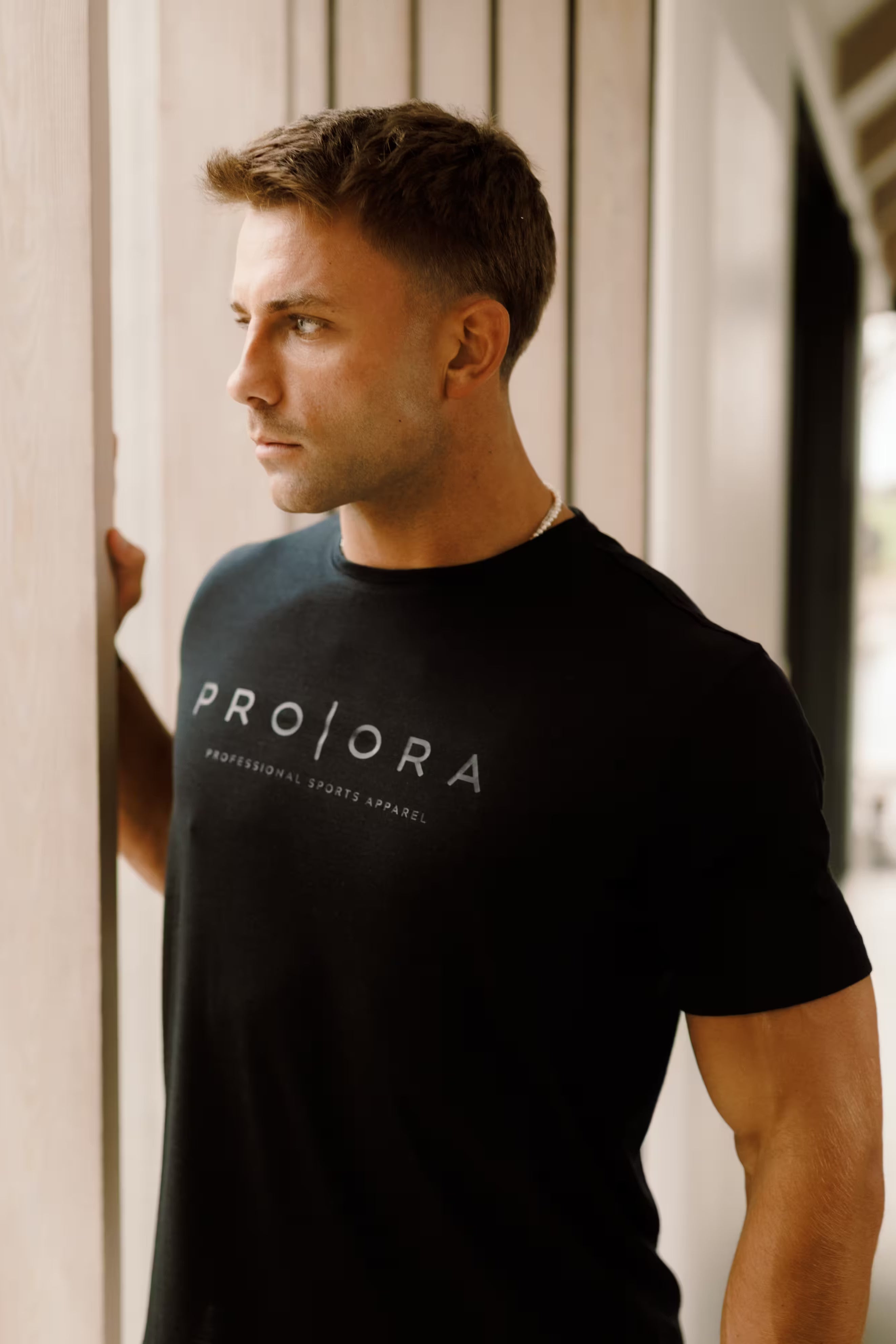 PRO | ORA men’s the merino t in Black On Black, worn during training