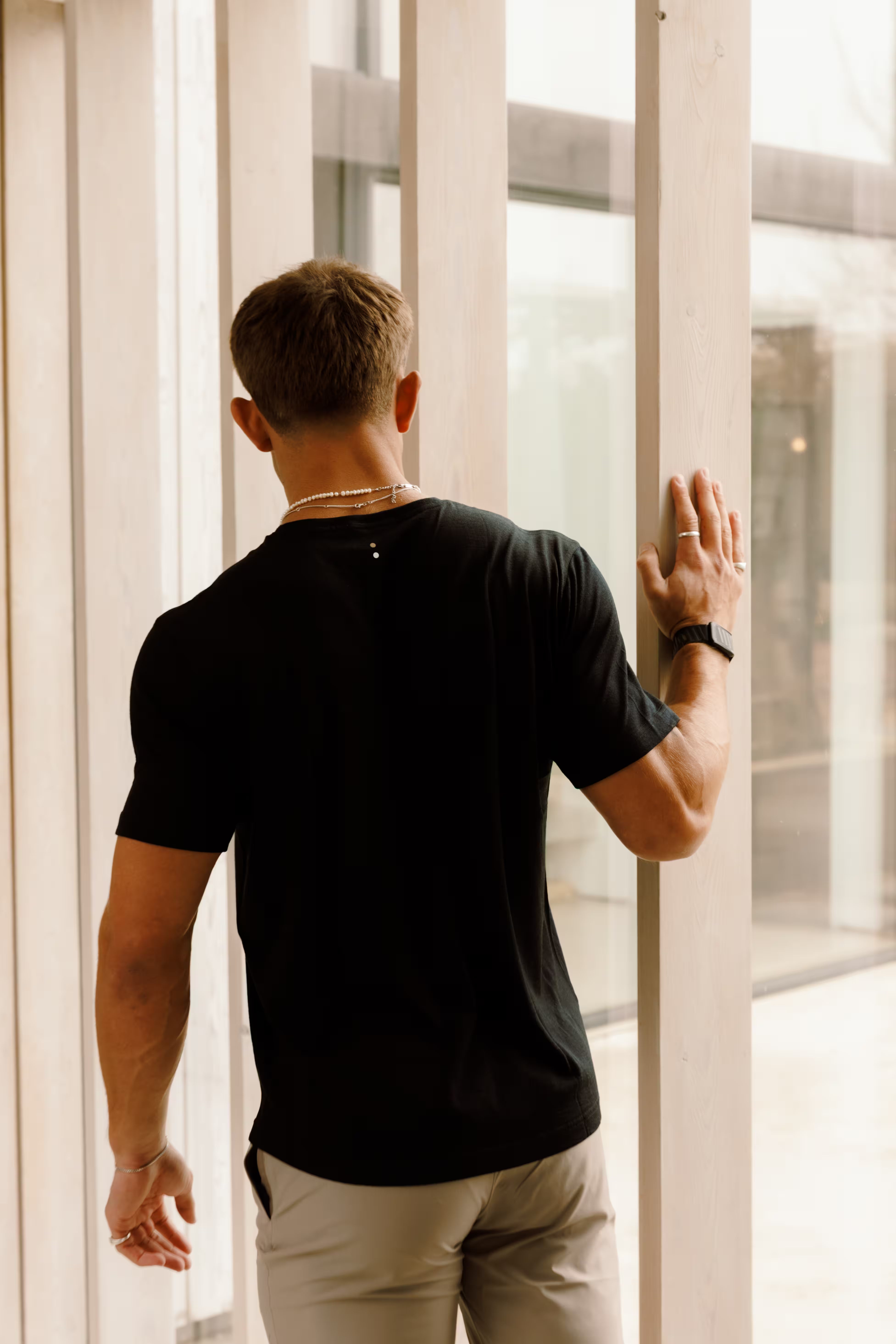 PRO | ORA men’s the merino t in Black On Black, worn for lifestyle