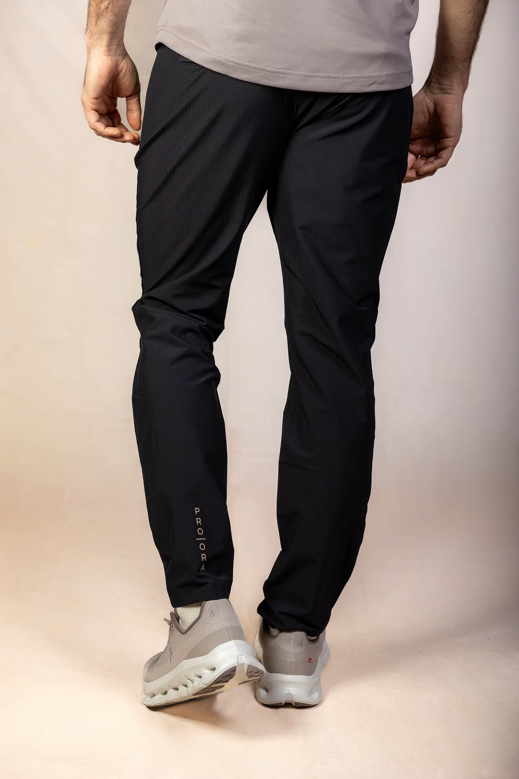 PRO | ORA men’s the precision trouser in Black Beauty, studio product image, rear view