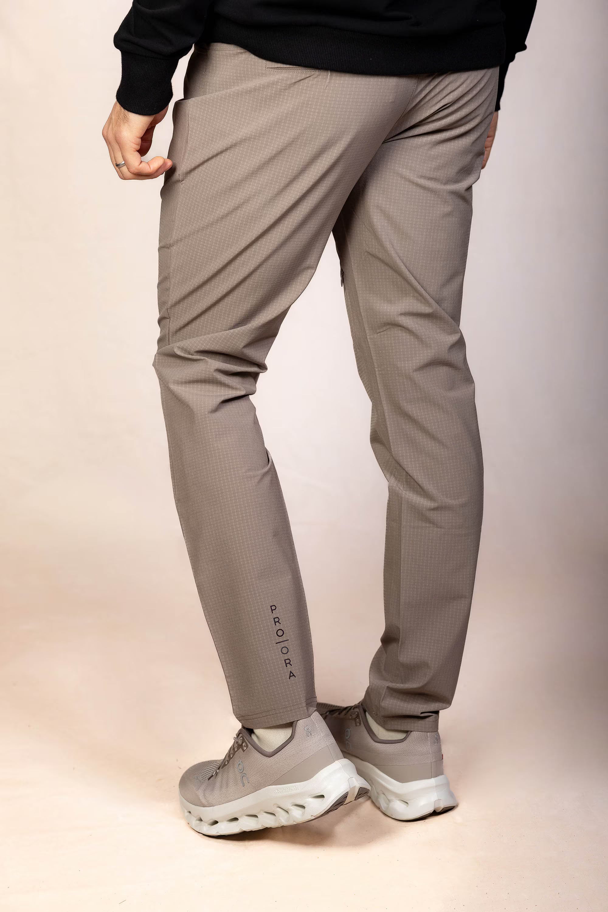 PRO | ORA men’s the precision trouser in Muted Clay, studio product image, rear view