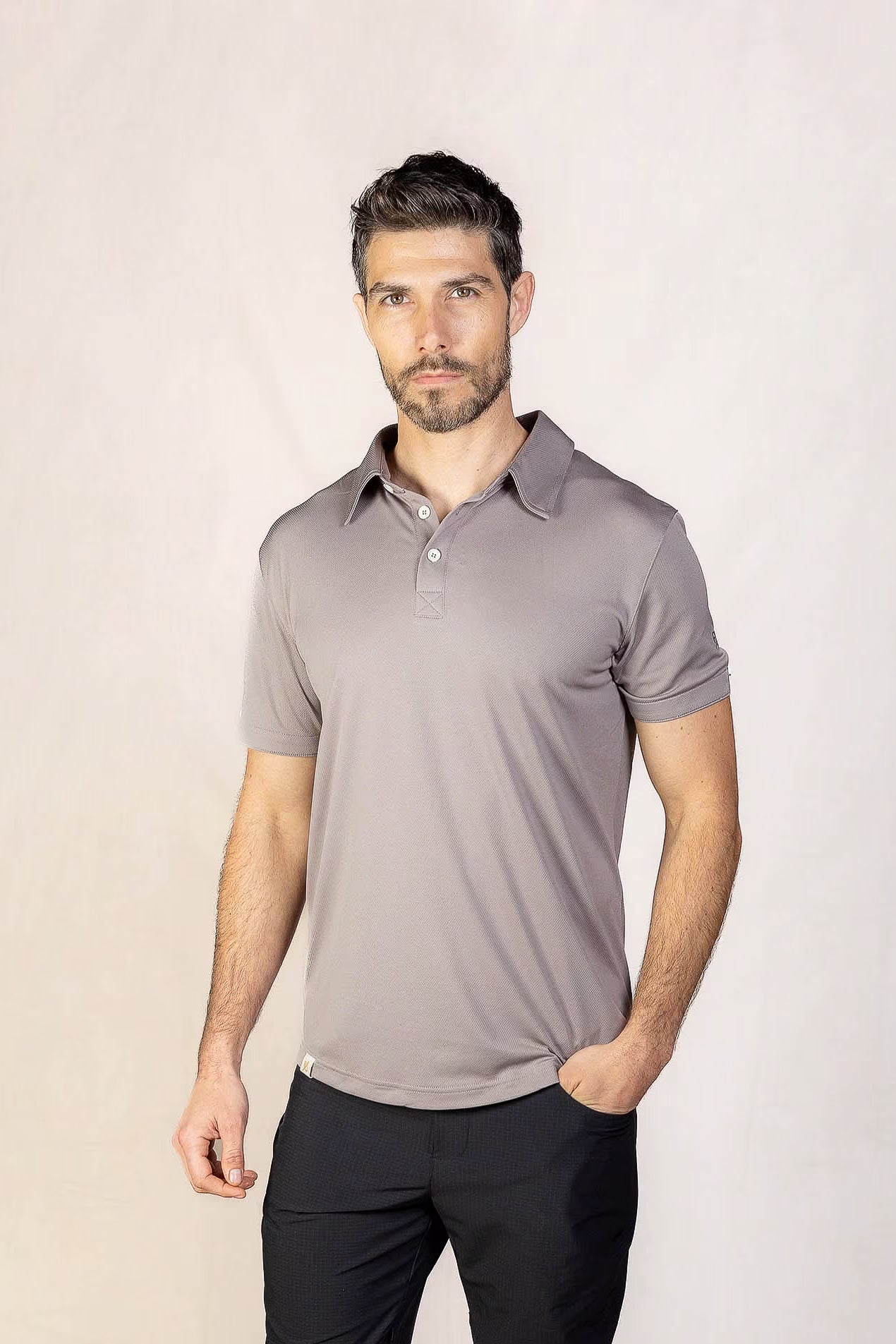 PRO | ORA men’s proformance polo shirt in Muted Clay, studio product image, front view