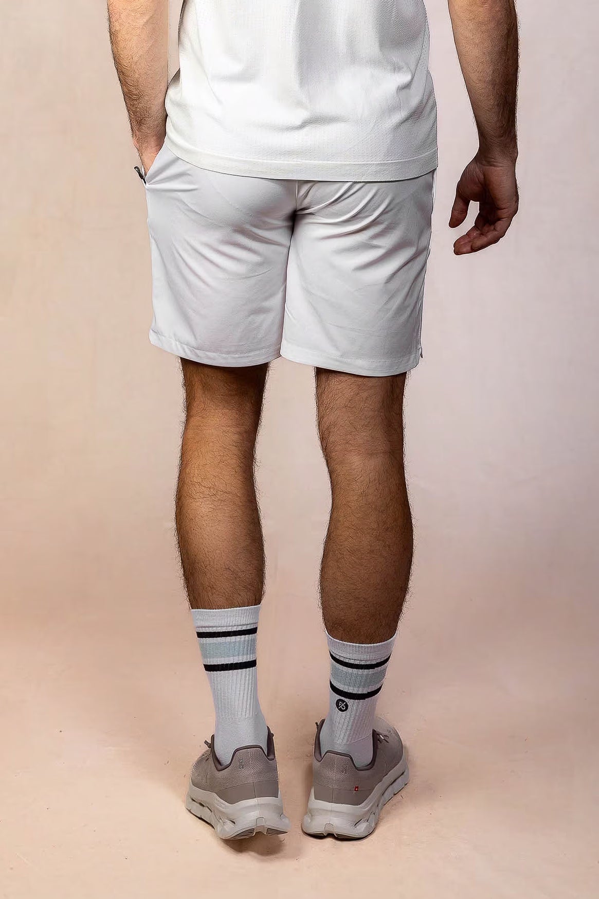 PRO | ORA men’s proformance short in White Onyx, studio product image, rear view
